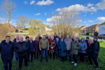 Picture of Grant and the Woolmer Green community at the pond.